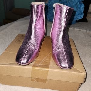 Shiny pink boots